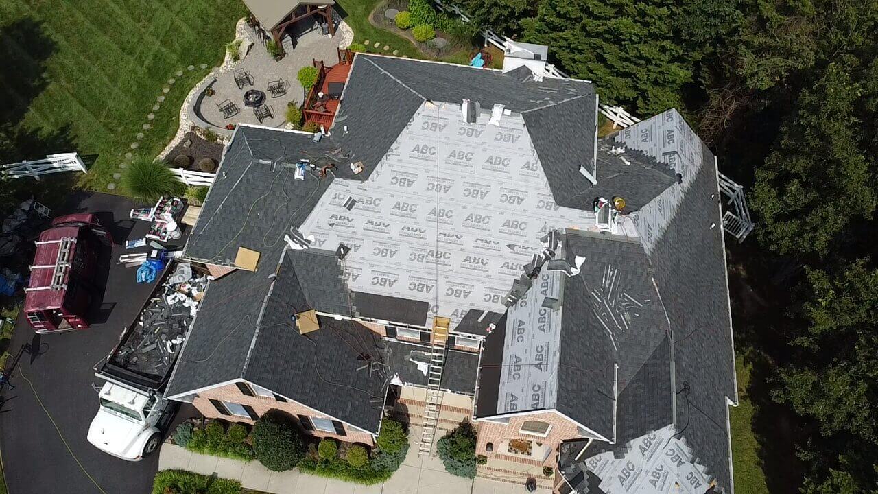 Aerial view of house roof under construction.